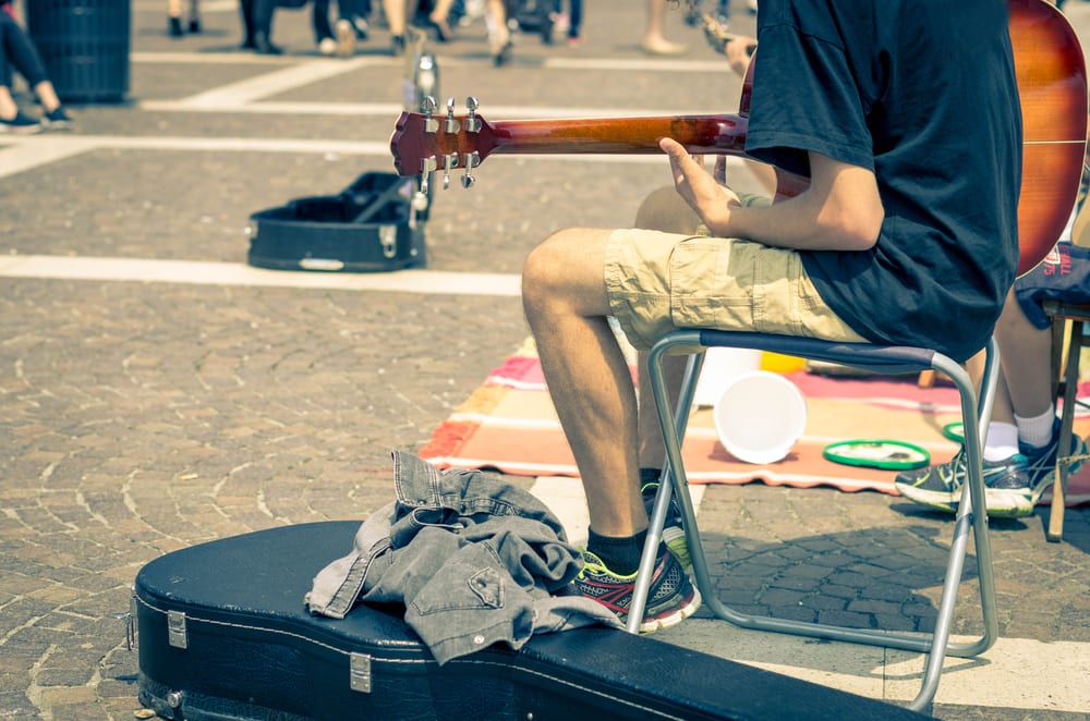 Street artist playing guitar